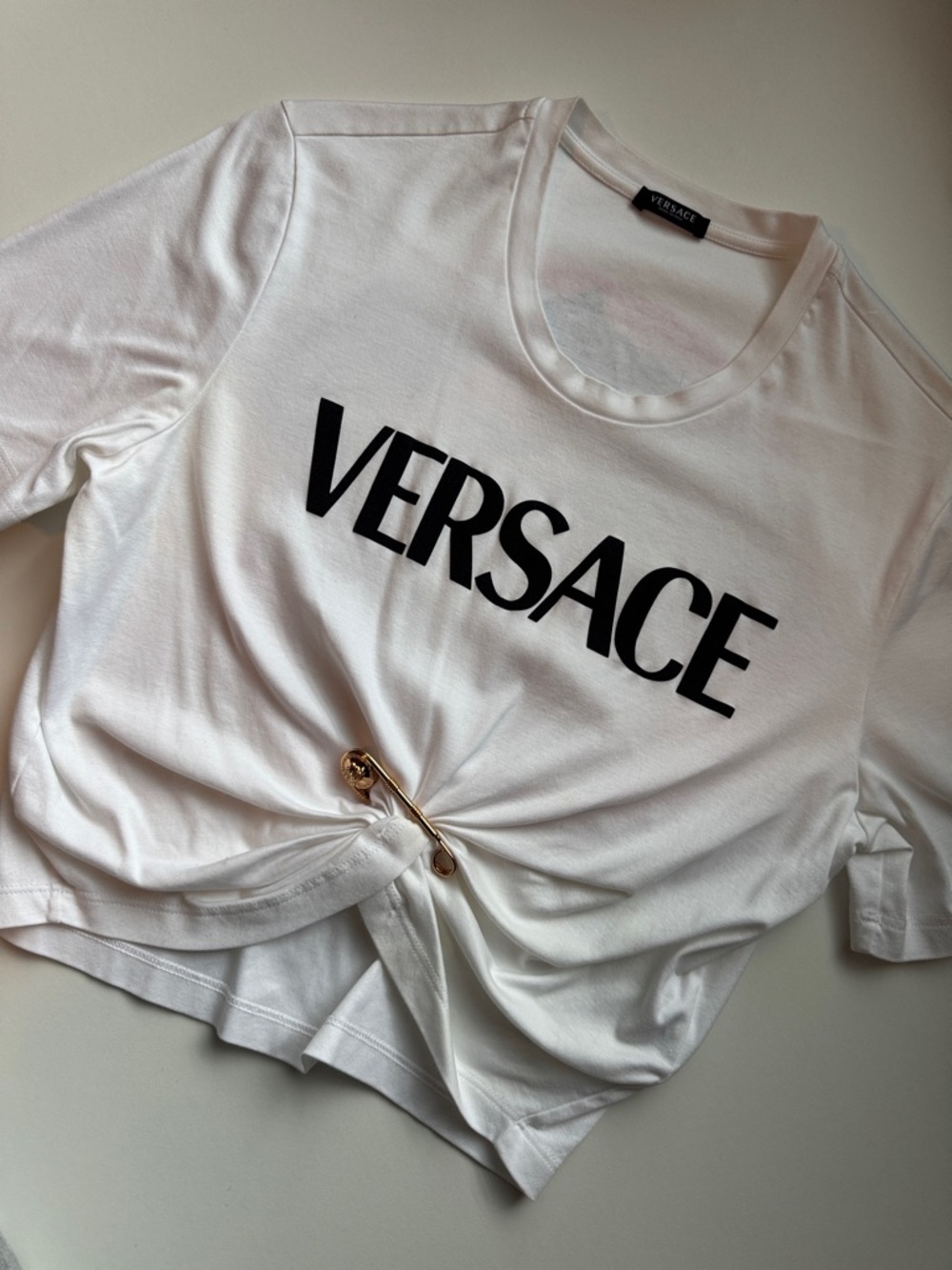 Versace White Short Sleeve Logo Tee with Black Print and Gold Pin